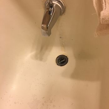 MarQueen Hotel - Shower / Tub. Use at your own risk. - Hotels Near Me - Seattle, Washington MarQueen Hotel - Shower / Tub. Use at your own risk. - Hotels Near Me - Seattle, Washington