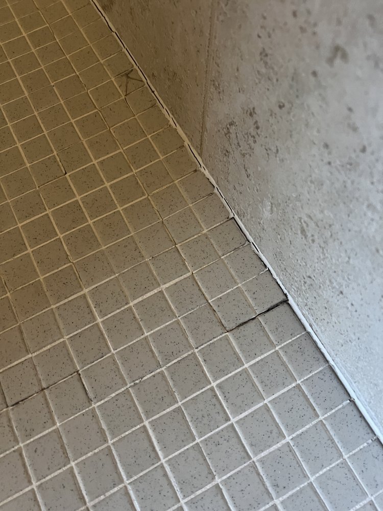 Slide of Pro Bath & Shower Caulking