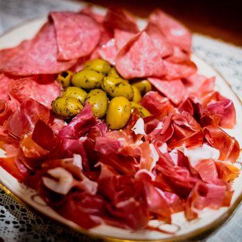 French 75 Gallery and Lounge - a plate of meat and olives - Art Galleries Near Me - Aurora, Illinois