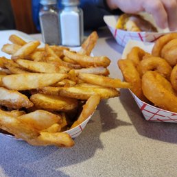 Fries and onion rings. Fries and onion rings.