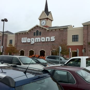 Wegmans - a large brick building with a clock tower - Grocery Near Me - Rochester, New York Wegmans - a large brick building with a clock tower - Grocery Near Me - Rochester, New York