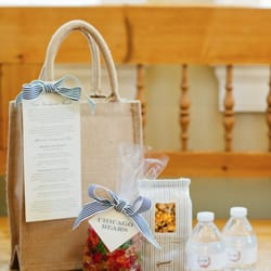 Custom welcome bag with wrap water bottles and Chicago themed goodies