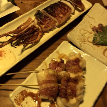 Ippuku - large hokkaido squid ($14)& bacon wrapped mochi ($8) - Bars Near Me - Berkeley, California