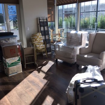 AddSpace To Your Life! - Before: Chaos, furniture, plastic and boxes - Home Organization Near Me AddSpace To Your Life! - Before: Chaos, furniture, plastic and boxes - Home Organization Near Me