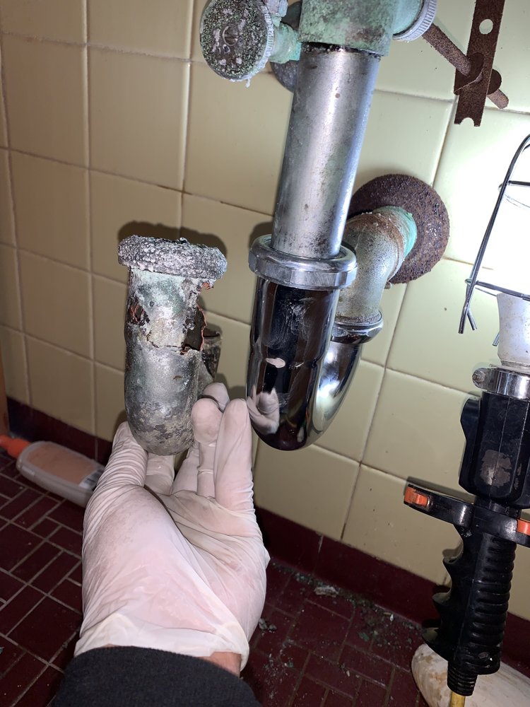 Slide of LMK Plumbing and Drain