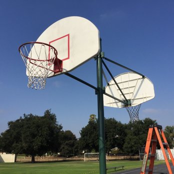 Handyman Instantly - Painted basketball support poles. - Handyman Near Me Handyman Instantly - Painted basketball support poles. - Handyman Near Me