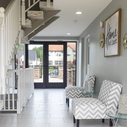 35 South Luxury Living - Walkway from courtyard to Logan St. Just past 3rd chair is office door
