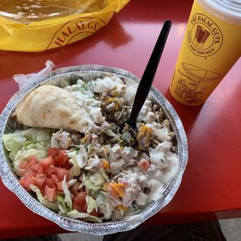 The Halal Guys - Chicken over rice platter! Do not go easy on the white sauce! Its all about the secret white sauce! - Halal Near Me - Aurora, Colorado