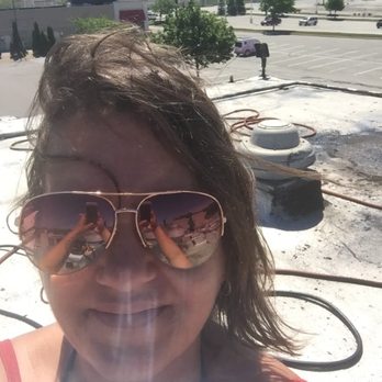 Kennedy Mechanical - Up on the rooftop of a restaurant in Merrillville performing routine maintenance. - Heating & Air Conditioning/HVAC Near Me