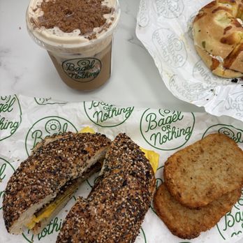 Bagel Or Nothing - Iced Banana Biscoff Latte, Sausage Egg & Cheese on an everything bagel, and Hashbrown - Bagels Near Me - Westampton, New Jersey