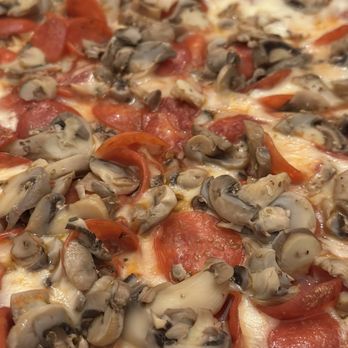Pizza John's - Pepperoni and mushroom (close up) - Pizza Near Me - Essex, Maryland Pizza John's - Pepperoni and mushroom (close up) - Pizza Near Me - Essex, Maryland