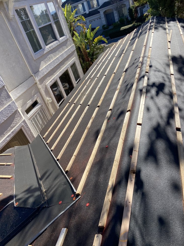 Slide of Rendon roofing