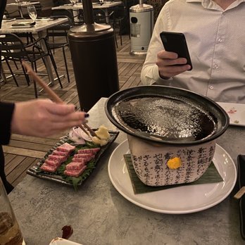 O-Ku - 2 oz of A5 Wagyu beef. They bring out a tabletop stone and grill on it as it heats over the flame. - Sushi Bars Near Me - Washington Dc, District of Columbia O-Ku - 2 oz of A5 Wagyu beef. They bring out a tabletop stone and grill on it as it heats over the flame. - Sushi Bars Near Me - Washington Dc, District of Columbia