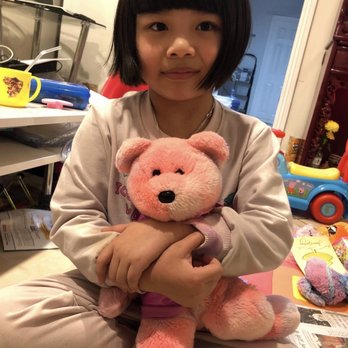 Domino's Pizza - a little girl holding a pink teddy bear - Pizza Near Me - Abbeville, Louisiana Domino's Pizza - a little girl holding a pink teddy bear - Pizza Near Me - Abbeville, Louisiana