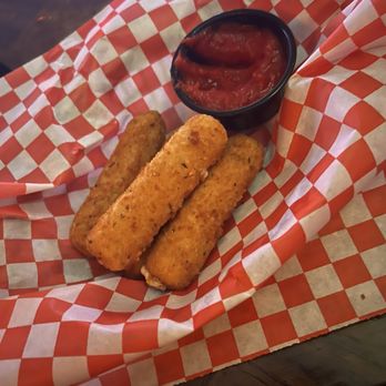 Nunya Neighborhood Bar - Mozzarella sticks with marinara - Sports Bars Near Me - Austin, Texas Nunya Neighborhood Bar - Mozzarella sticks with marinara - Sports Bars Near Me - Austin, Texas