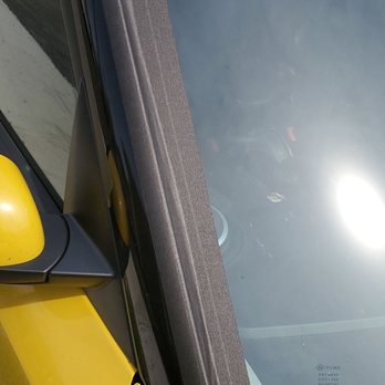 Auto Glass Now - They put glue on the fasteners and tape over it to hold it in place. - Windshield Installation & Repair Near Me - Dayton, Ohio Auto Glass Now - They put glue on the fasteners and tape over it to hold it in place. - Windshield Installation & Repair Near Me - Dayton, Ohio