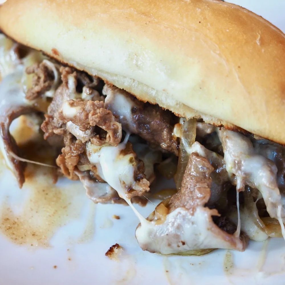 Real Steak & cheese made to perfection not bits and pieces and no hint of cheese