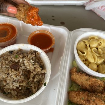 Lindiana's Southern Vegan Kitchen - Dirty rice, tender dipped in Buffalo sauce, Mac n non-cheese, tenders (I think they gave me like 5 or 6, plenty of food!) - Vegan Near Me - Houston, Texas Lindiana's Southern Vegan Kitchen - Dirty rice, tender dipped in Buffalo sauce, Mac n non-cheese, tenders (I think they gave me like 5 or 6, plenty of food!) - Vegan Near Me - Houston, Texas