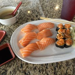 Salmon sushi, spicy salmon roll, miso soup Salmon sushi, spicy salmon roll, miso soup