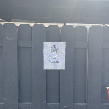 Dinosaur Bar-B-Que - The no-smoking signs where the smokers are. - Barbeque Near Me - Rochester, New York Dinosaur Bar-B-Que - The no-smoking signs where the smokers are. - Barbeque Near Me - Rochester, New York