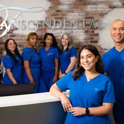 Meet the team behind your smile -- Dr. Hanna, Dr. Bui, and our amazing staff at Transcendental.