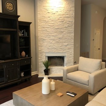 I-Renovate Austin - a living room with a fireplace - General Contractors Near Me I-Renovate Austin - a living room with a fireplace - General Contractors Near Me