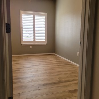 The Floor Store - an empty room with a ceiling fan - Carpeting Near Me - Albuquerque, New Mexico