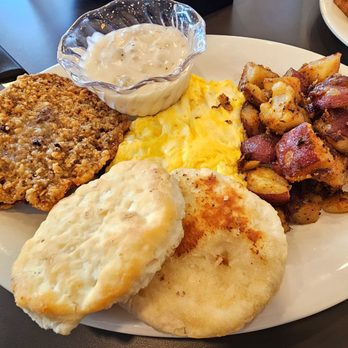 Eggs Up Grill - Chicken fried steak with eggs potatoes gravy and a biscuit - Breakfast & Brunch Near Me - Winston Salem, North Carolina Eggs Up Grill - Chicken fried steak with eggs potatoes gravy and a biscuit - Breakfast & Brunch Near Me - Winston Salem, North Carolina