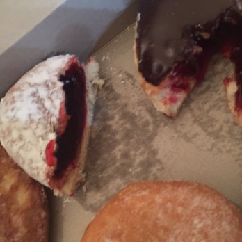 Dandee Donut Factory - Half of my jelly filled donut. - Donuts Near Me - Margate, Florida