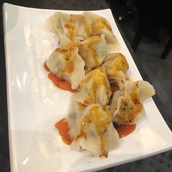 Les Raviolis de Chez Moi - Pork and chive dumplings + chili oil - Chinese Near Me - Paris, 75 Les Raviolis de Chez Moi - Pork and chive dumplings + chili oil - Chinese Near Me - Paris, 75