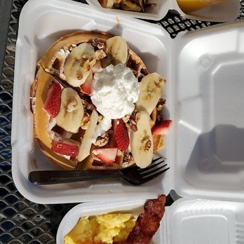 Egg House Cafe - Strawberry banana waffle meal and a side of ranch potatoes - Breakfast & Brunch Near Me - Denton, Texas