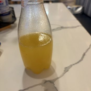 The Gyro Project - Fizzy orange lemonade like beverage- very tasty and not overly sweet! - Salad Near Me - Fort Lee, New Jersey The Gyro Project - Fizzy orange lemonade like beverage- very tasty and not overly sweet! - Salad Near Me - Fort Lee, New Jersey