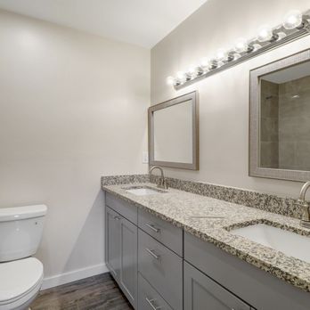 Titan Home Improvements - a bathroom with granite countertops - General Contractors Near Me - Gilbert, Arizona