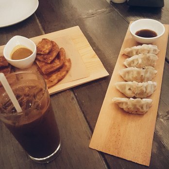 Thailand Modern Eatery - Gyoza and scallion pancakes. - Thai Near Me - Providence, Rhode Island Thailand Modern Eatery - Gyoza and scallion pancakes. - Thai Near Me - Providence, Rhode Island