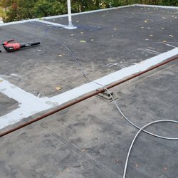 Pro Roofing And Construction - Resealing seams on rubber roof