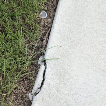 Dastani Homes - a crack in a sidewalk - General Contractors Near Me - Lehigh Acres, Florida Dastani Homes - a crack in a sidewalk - General Contractors Near Me - Lehigh Acres, Florida