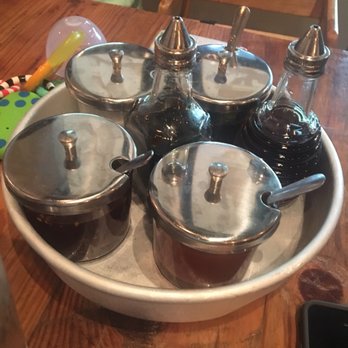 Bida Manda - The Phó spice tray (fish oil, soy sauce, pepper sauce and sugar) - Laotian Near Me - Raleigh, North Carolina Bida Manda - The Phó spice tray (fish oil, soy sauce, pepper sauce and sugar) - Laotian Near Me - Raleigh, North Carolina