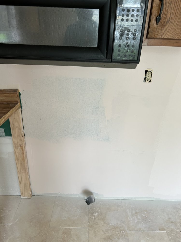 Slide of George’s Home Improvement