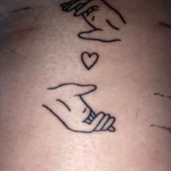 Alternative Arts Tattoo - Hands holding a heart