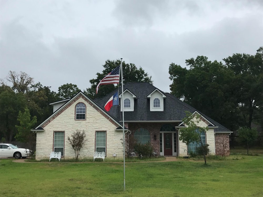 Slide of Spartan Exteriors