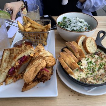 The Mayfly - Fried chicken sandwich with fries Kale salad Sour cream and onion dip with crostini - American Near Me - New York, New York The Mayfly - Fried chicken sandwich with fries Kale salad Sour cream and onion dip with crostini - American Near Me - New York, New York