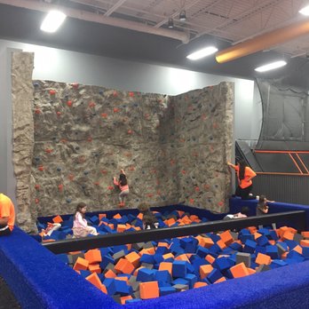 Sky Zone Trampoline Park - Foam block pit with climbing wall - Trampoline Parks Near Me - Springfield, Illinois Sky Zone Trampoline Park - Foam block pit with climbing wall - Trampoline Parks Near Me - Springfield, Illinois