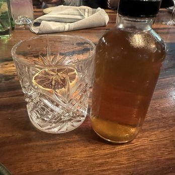 COMMUNION Restaurant and Bar - Bottles Uncle Nearest Old Fashioned - Soup Near Me - Seattle, Washington