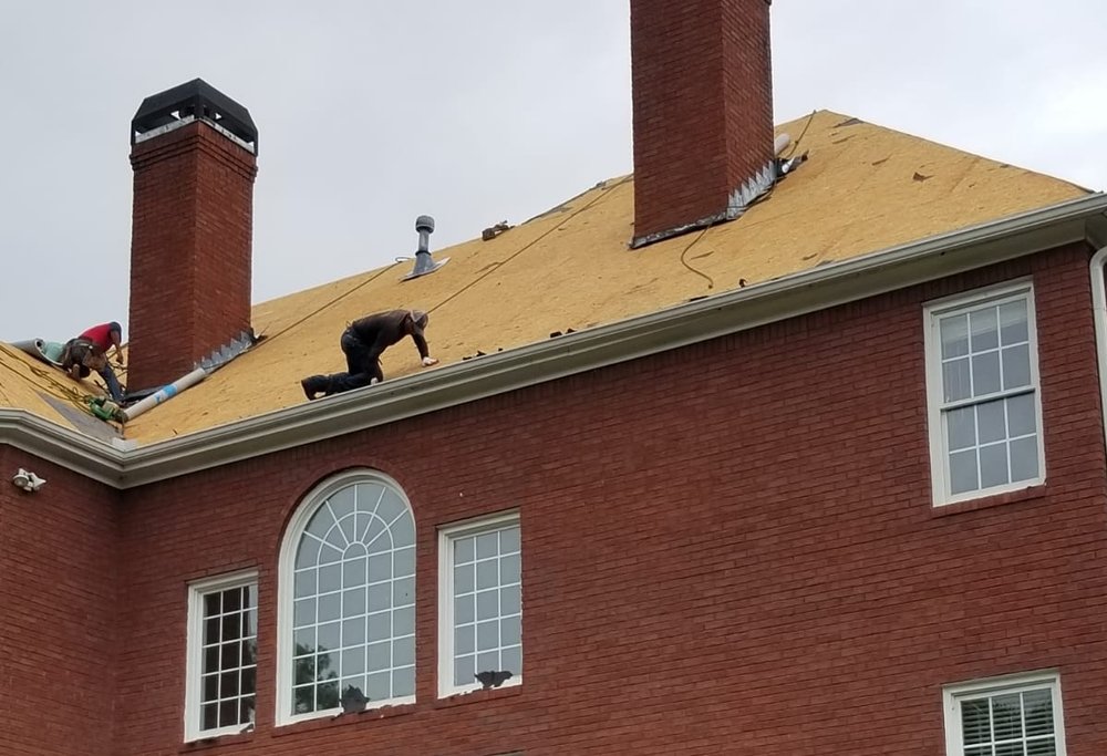 Slide of Top Edge Roofing and Construction