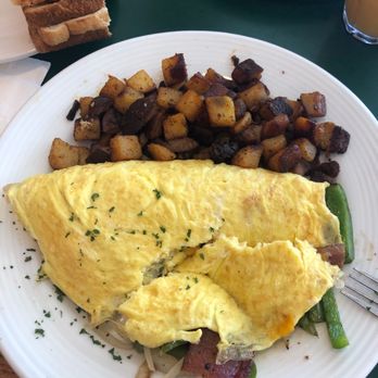 The Frog Pond - Hangover Omelette. 8/10 - Breakfast & Brunch Near Me - St Pete Beach, Florida The Frog Pond - Hangover Omelette. 8/10 - Breakfast & Brunch Near Me - St Pete Beach, Florida
