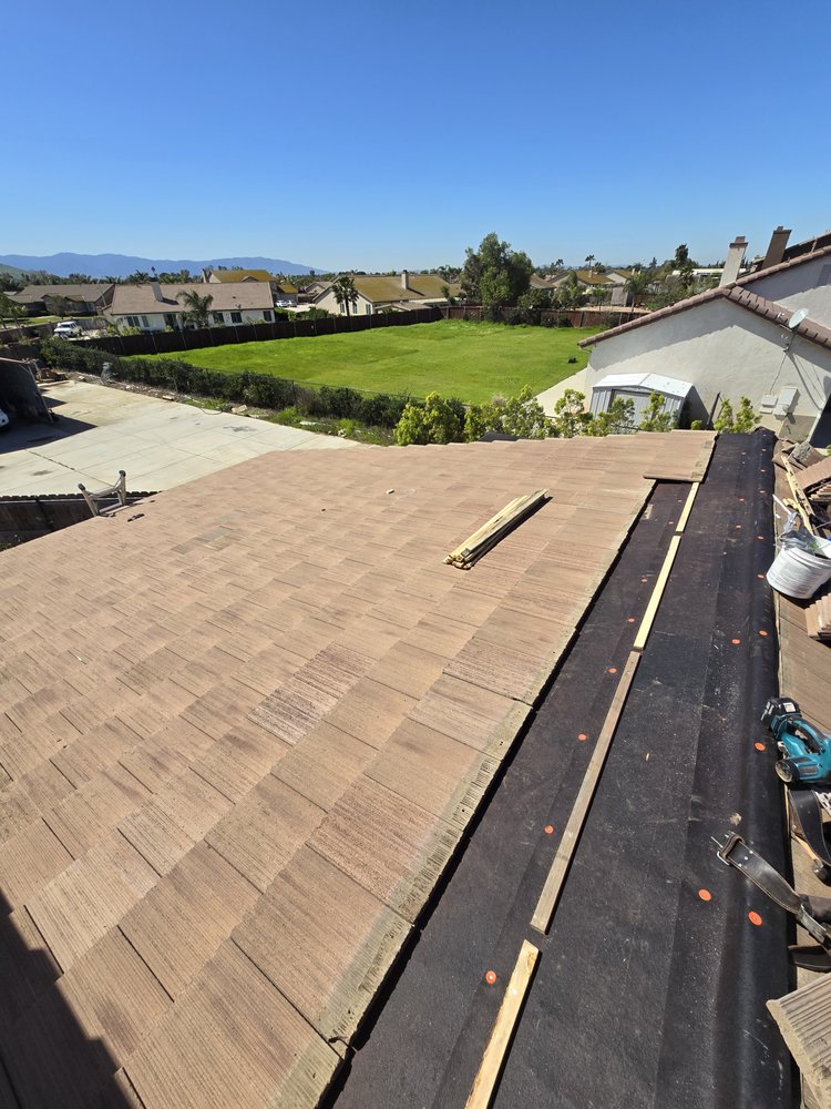 Slide of Eminent Roofing