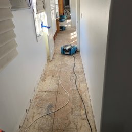 The hallway-minus the flooring--showing a heater. The hallway-minus the flooring--showing a heater.