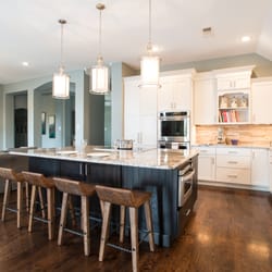 LoneStar Design Build - An over-sized island provides plenty of seating for guests.