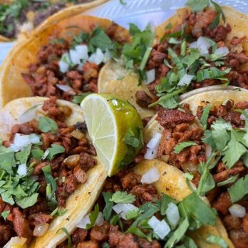 The Grub Lot - a plate of tacos on a table - Food Trucks Near Me - Erath, Louisiana The Grub Lot - a plate of tacos on a table - Food Trucks Near Me - Erath, Louisiana
