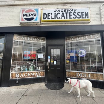 Raceway Delicatessen - a dog standing in front of a store - Delis Near Me - Carle Place, New York Raceway Delicatessen - a dog standing in front of a store - Delis Near Me - Carle Place, New York